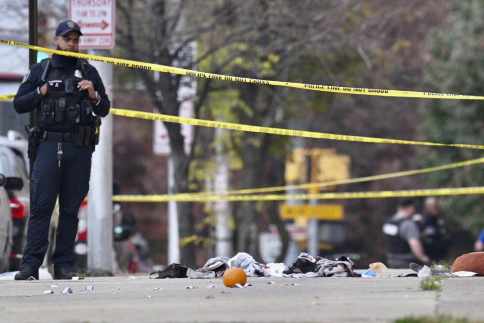 Baltimore City Police officers work in the 2600 block of Wilkens Avenue in the Milhill neighborhood, of southwest Baltimore, on Tuesday, Nov. 7, 2023. Body camera recordings released on Friday, Nov. 17, show four officers fired three dozen shots, killing Hunter Jessup, who appeared to fire his own weapon before he was struck by gunfire. (Jerry Jackson/The Baltimore Sun via AP)