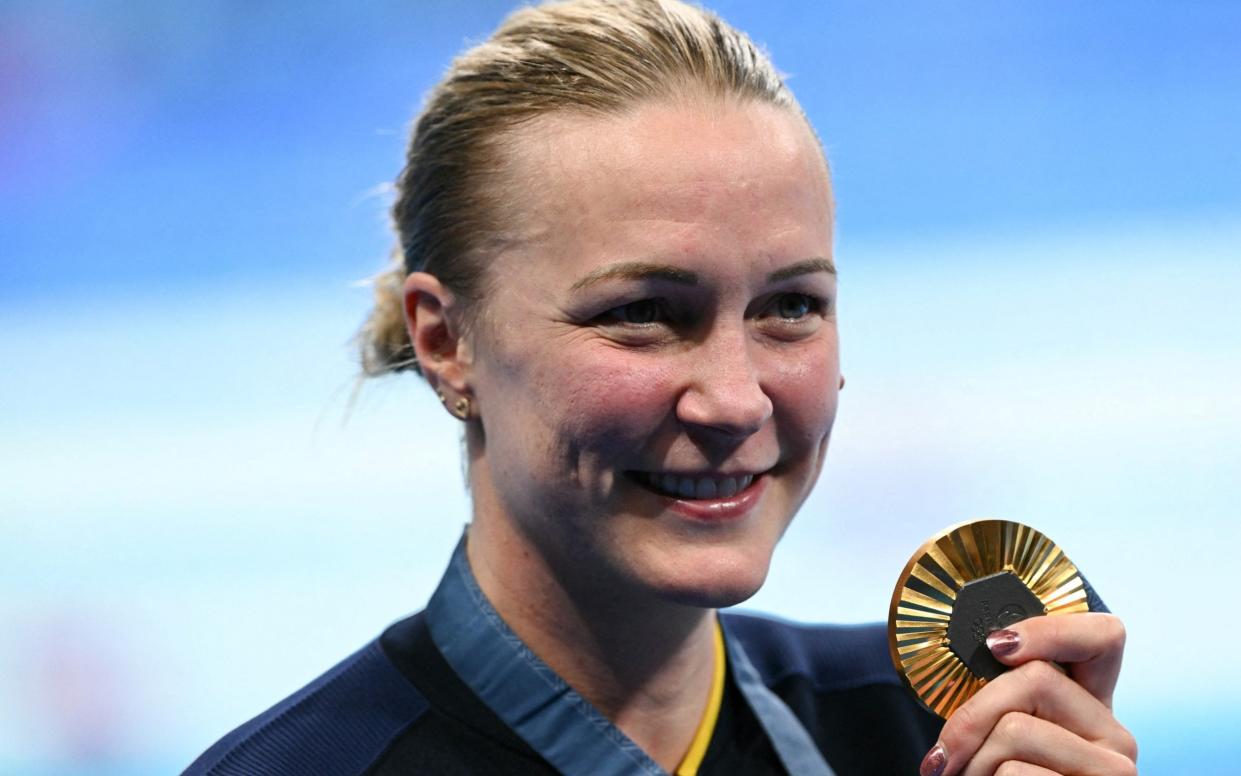 Sarah Sjoestroem celebrates her gold medal winning effort in the Women's 50m Freestyle Final