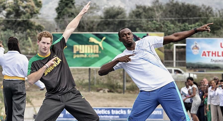 Prince Harry with Usain Bolt. Photo: Getty Images.