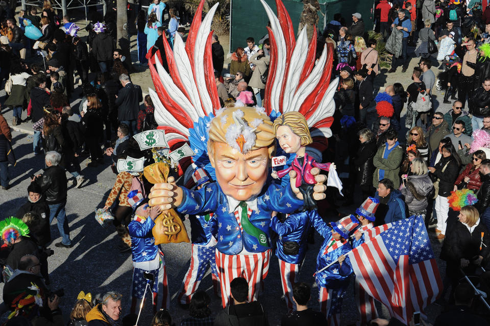 <p>A giant papier-mache float representing American President Donald Trump and Candidate Hillary Clinton moves through the streets of Viareggio during the traditional Carnival of Viareggio parade on Feb. 12, 2017 in Viareggio, Italy. (Photo: Laura Lezza/Getty Images) </p>