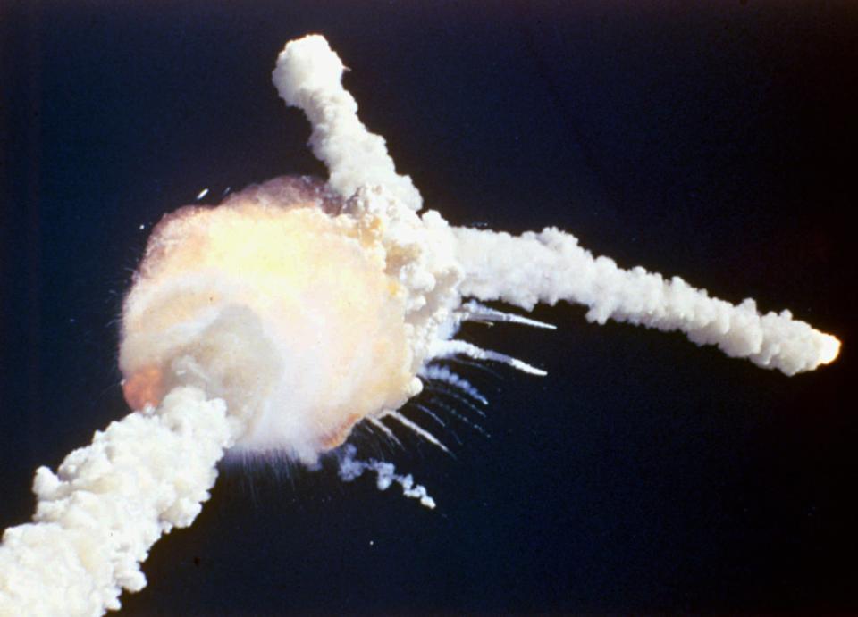 A file picture from January 28, 1986, shows the explosion of space shuttle Challenger over Cape Canaveral. The space shuttle exploded 74 seconds after launch, killing all seven astronauts on board. (AP Photo/handout)