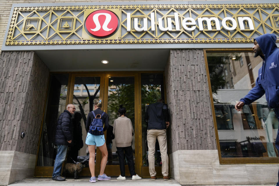 People view a ransacked Lululemon store in Philadelphia, Wednesday, Sept. 27, 2023. Police say groups of teenagers swarmed into stores across Philadelphia in an apparently coordinated effort, stuffed bags with merchandise and fled. (AP Photo/Matt Rourke)