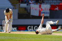 Cricket - Test Match - New Zealand v England - Eden Park, Auckland, New Zealand, March 22, 2018. England's Jonny Bairstow reacts as New Zealand's Tim Southee celebrates after catching him out during the first day of the first cricket test match. REUTERS/David Gray