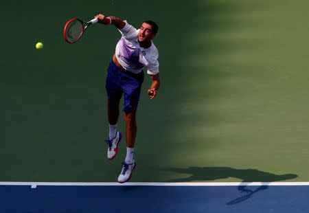 Sep 2, 2015; New York, NY, USA; Marin Cilic of Croatia serves to Evgeny Donskoy of Russia on day three of the 2015 U.S. Open tennis tournament at USTA Billie Jean King National Tennis Center. Mandatory Credit: Jerry Lai-USA TODAY Sports