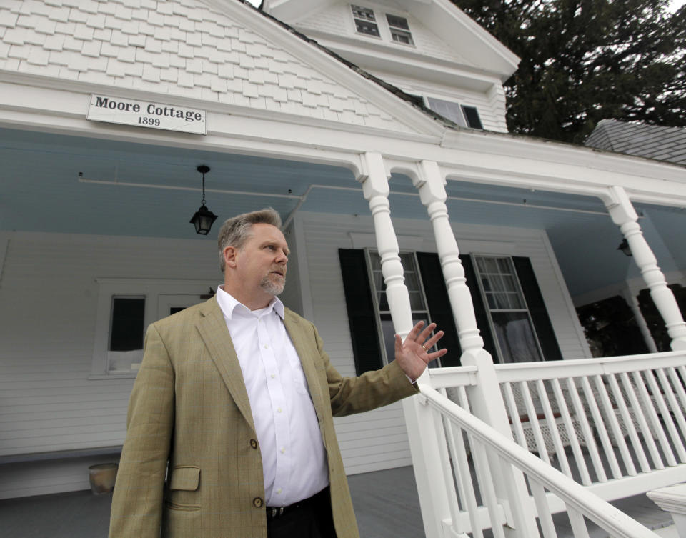 Jerry Pattengale, a college administrator hired to help find a new owner of an historic 217-acre campus in Northfield, Mass., conducts a tour of the campus, in this photo taken Thursday, March 8, 2012. The campus, along with its 43 buildings, is being offered for free to an orthodox Christian group who can come up a solid plan to use it. (AP Photo/Elise Amendola)