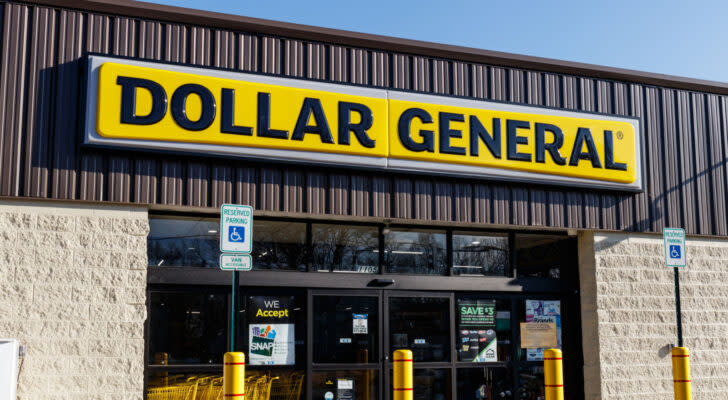 The front of a Dollar General (DG Stock) store on a sunny day.
