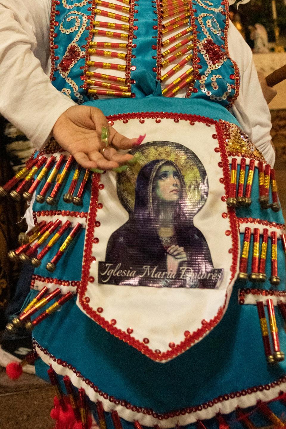 Members of Danza Guadalupe dance in Our Lady of Guadalupe Catholic Church last year as they celebrate her feast day, which commemorates the appearance of the Virgin Mary to indigenous peasant Juan Diego in 1531 in Mexico.