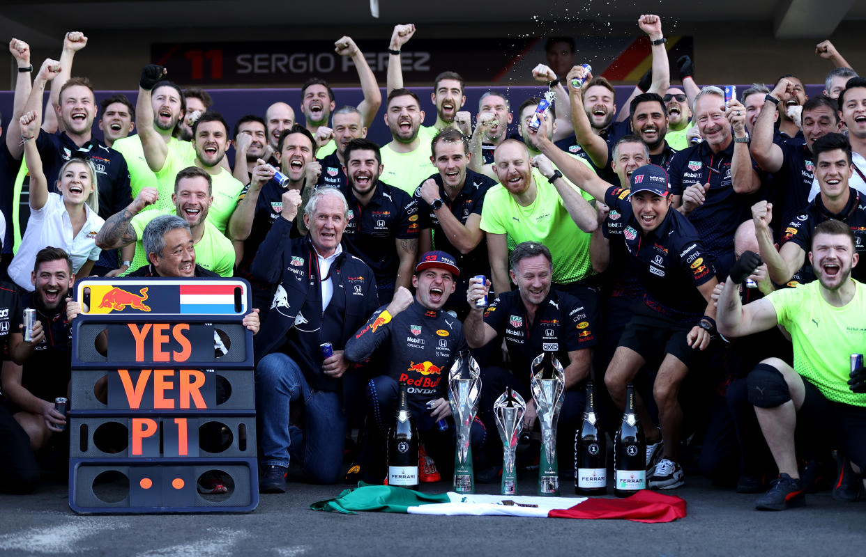 MEXICO CITY, MEXICO - NOVEMBER 07: Race winner Max Verstappen of Netherlands and Red Bull Racing and third placed Sergio Perez of Mexico and Red Bull Racing celebrate with their team after the F1 Grand Prix of Mexico at Autodromo Hermanos Rodriguez on November 07, 2021 in Mexico City, Mexico. (Photo by Lars Baron/Getty Images)