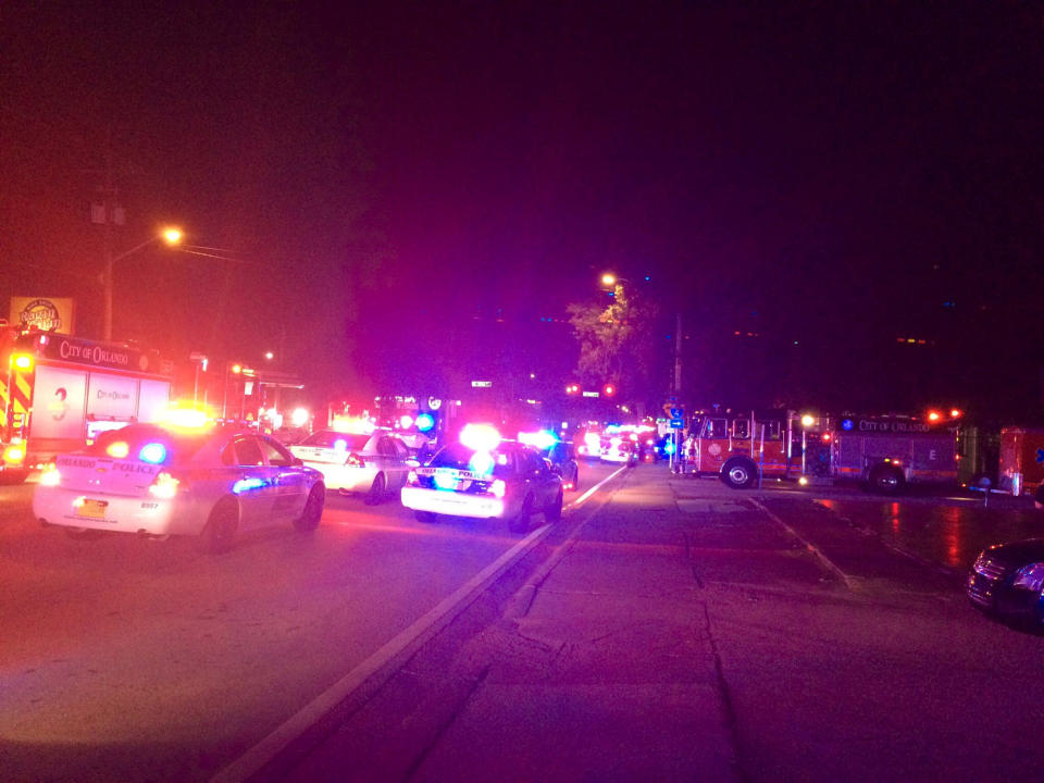 <p>Police cars and fire trucks are seen outside the Pulse night club where police said a suspected gunman left multiple people dead and injured in Orlando, Florida, June 12, 2016. (Orlando Police Department/Handout via REUTERS) </p>