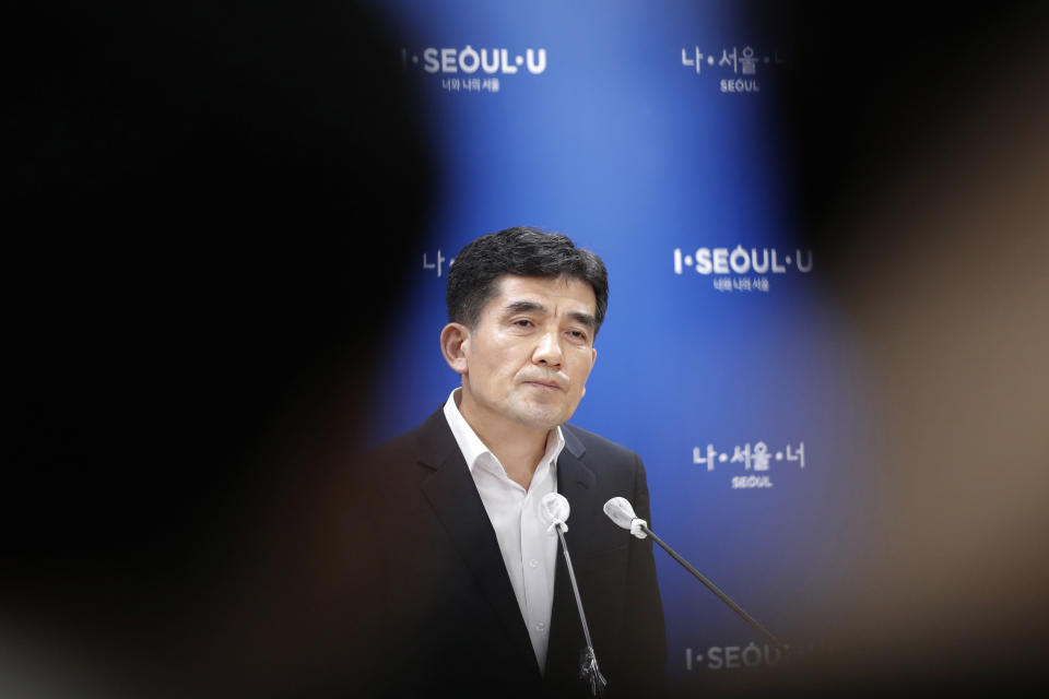 Seoul Metropolitan Government spokesperson Hwang In-sik listens to reporter's question at Seoul City Hall in Seoul, South Korea, Wednesday, July 15, 2020. The city government of the South Korean capital, Seoul, said Wednesday it will launch an investigation into allegations of sexual misconduct surrounding late Mayor Park Won-soon, who was found dead after one of his secretaries filed a complaint claiming yearslong abuse. (AP Photo/Lee Jin-man)