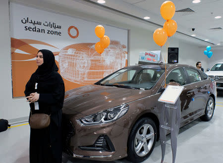 A Saudi woman is seen at the first automotive showroom solely dedicated for women in Jeddah, Saudi Arabia January 11, 2018. REUTERS/Reem Baeshen