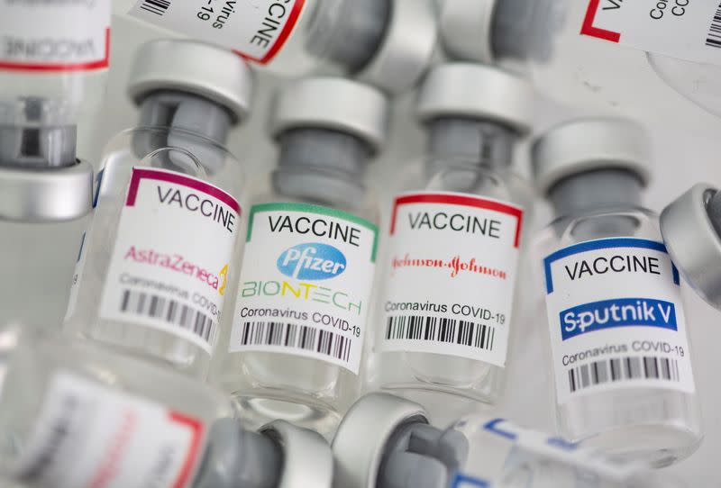 FILE PHOTO: Vials labelled "AstraZeneca, Pfizer - Biontech, Johnson&Johnson, Sputnik V coronavirus disease (COVID-19) vaccine" are seen in this illustration picture