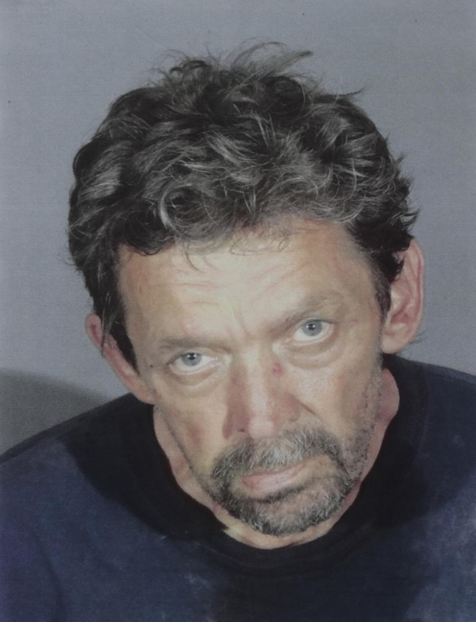 A police mug shot of John David Corey.