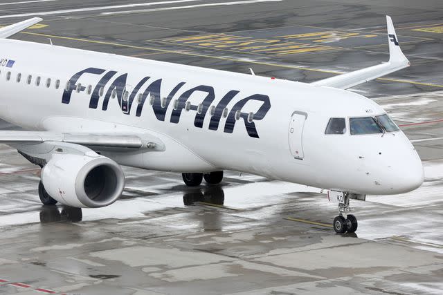 <p>Bodo Marks/picture alliance via Getty</p> A Finnair flight appears at the Hamburg Airport in July 2022