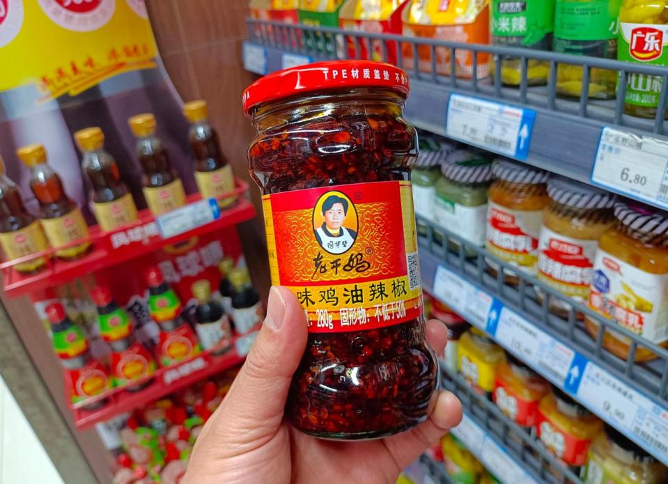 PHOTO: In this March 12, 2023, file photo, Lao Gan Ma chili sauce is seen on a supermarket shelf in Suqian, Jiangsu province, China. (Future Publishing via Getty Images, FILE)