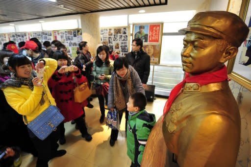 This photo taken on March 3 shows visitors at the newly opened Lei Feng memorial museum in Hangzhou, east China's Zhejiang province as part of a huge public campaign to commemorate the 50th anniversary of Lei Feng's death