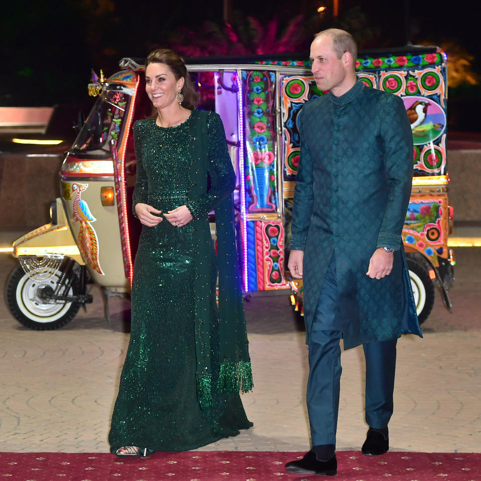 Prince William, Duke of Cambridge and Catherine, Duchess of Cambridge wear green as a nod to Pakistan's flag. [Photo: Getty]