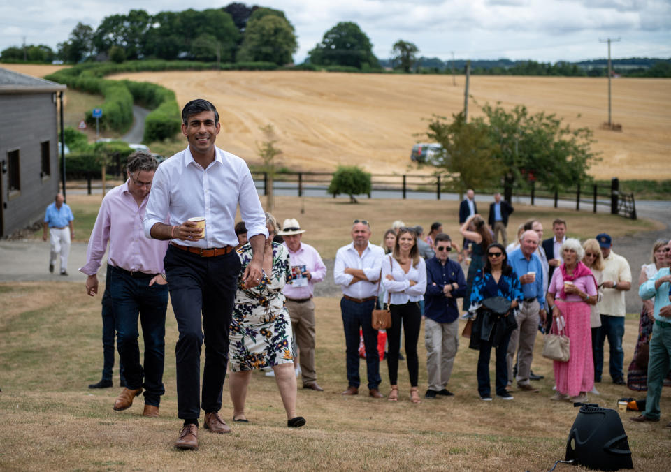 WINCHESTER, ENGLAND - JULY 30: Rishi Sunak, Conservative Party leadership candidate and MP, arrives to speak to a crowd during his campaigning at Manor Farm, on July 30, 2022 in Ropley near Winchester, England. Chris J Ratcliffe/Pool via REUTERS