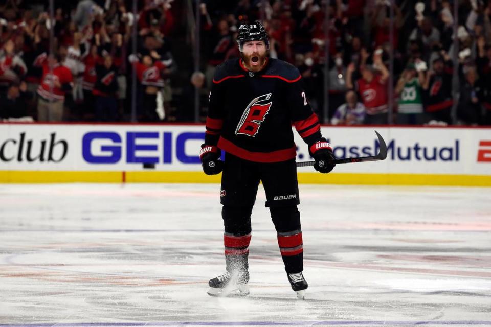 Carolina Hurricanes’ Ian Cole (28) celebrates his overtime goal against the New York Rangers in Game 1 of an NHL hockey Stanley Cup second-round playoff series in Raleigh, N.C., Wednesday, May 18, 2022. (AP Photo/Karl B DeBlaker)