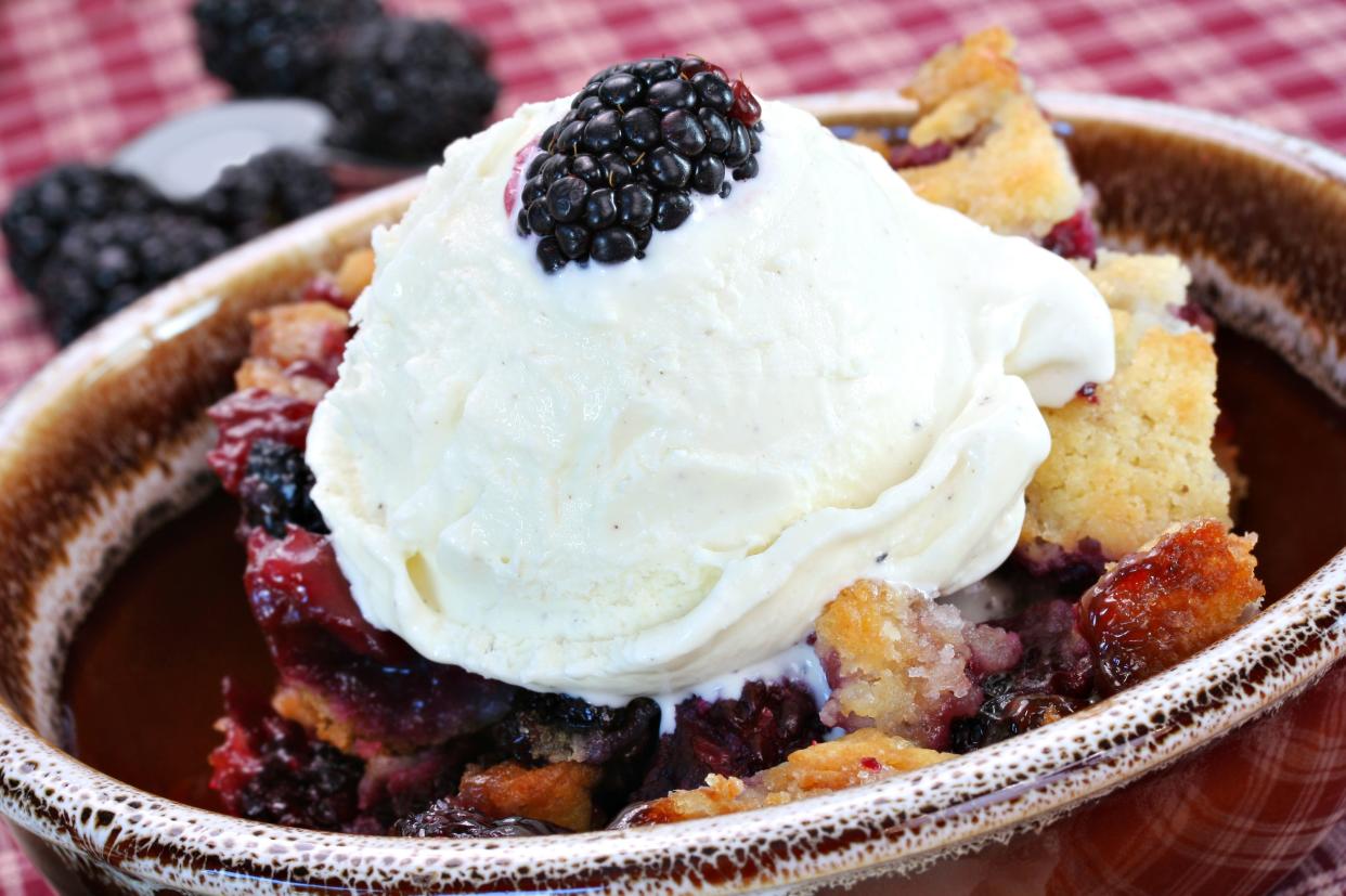 Fresh and delicious blackberry cobbler with French vanilla ice cream.