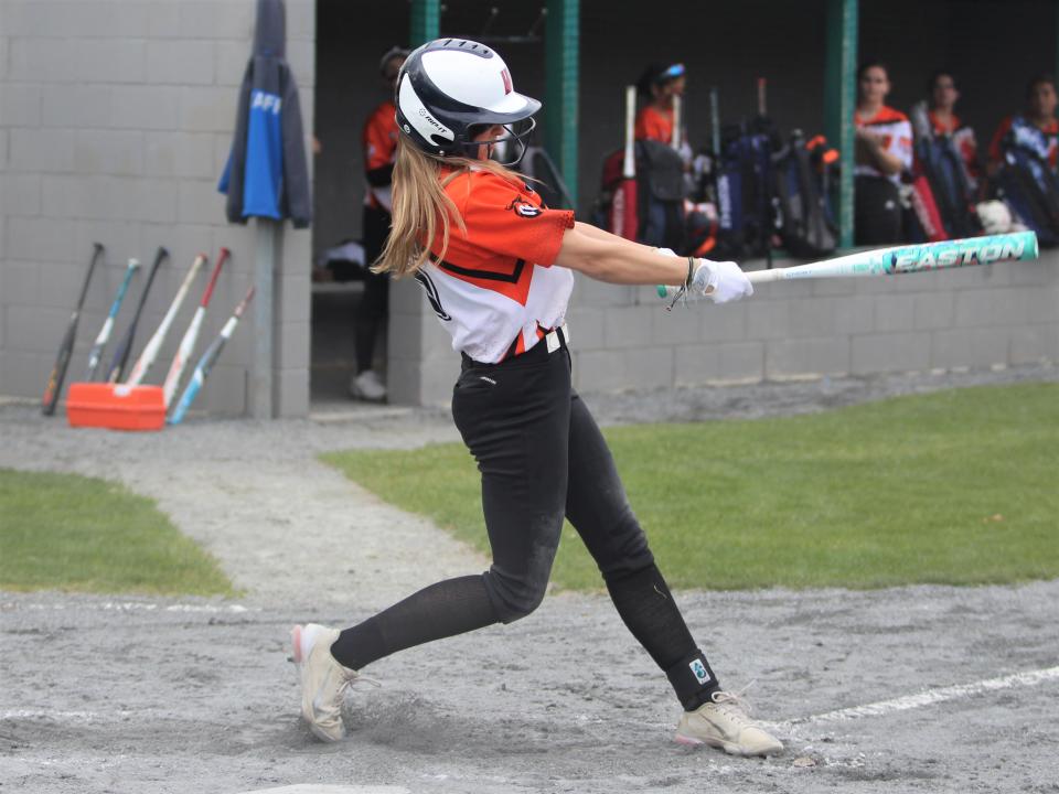 Diman's Courtney Boies gets a hit during a Mayflower League game against Bristol-Plymouth.