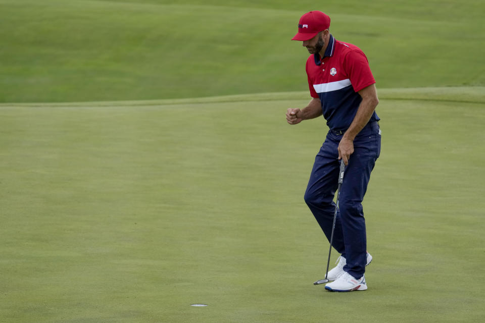 Team USA's Dustin Johnson reacts to his putt on the 17th hole during a Ryder Cup singles match at the Whistling Straits Golf Course Sunday, Sept. 26, 2021, in Sheboygan, Wis. (AP Photo/Ashley Landis)