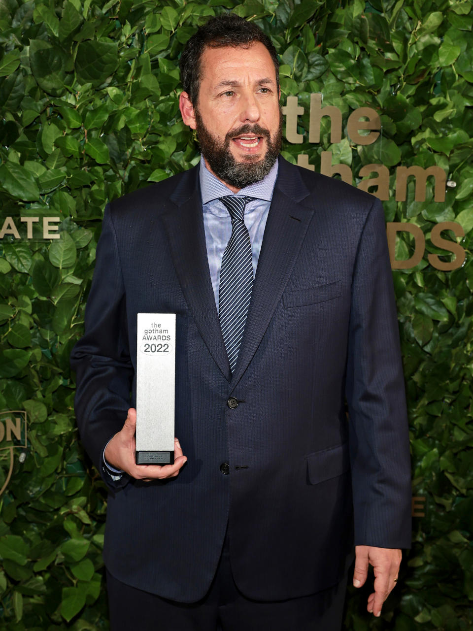 Adam Sandler with the Performer Tribute award at The Gotham Awards (Dimitrios Kambouris / Getty Images)