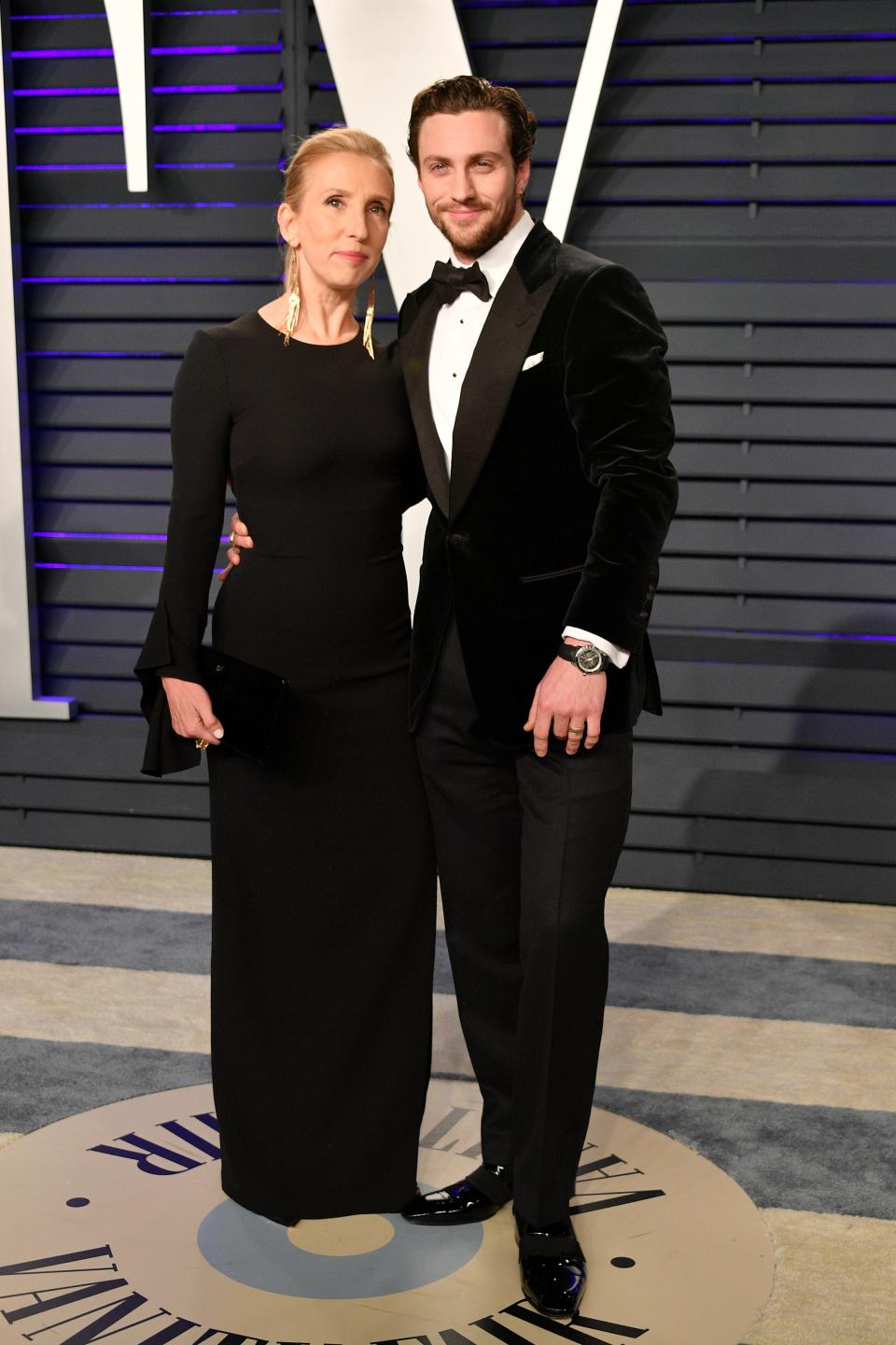 BEVERLY HILLS, CA - FEBRUARY 24:  Sam Taylor-Johnson (L) and Aaron Taylor-Johnson attend the 2019 Vanity Fair Oscar Party hosted by Radhika Jones at Wallis Annenberg Center for the Performing Arts on February 24, 2019 in Beverly Hills, California.  (Photo by Dia Dipasupil/Getty Images) ORG XMIT: 775287342 ORIG FILE ID: 1127197906