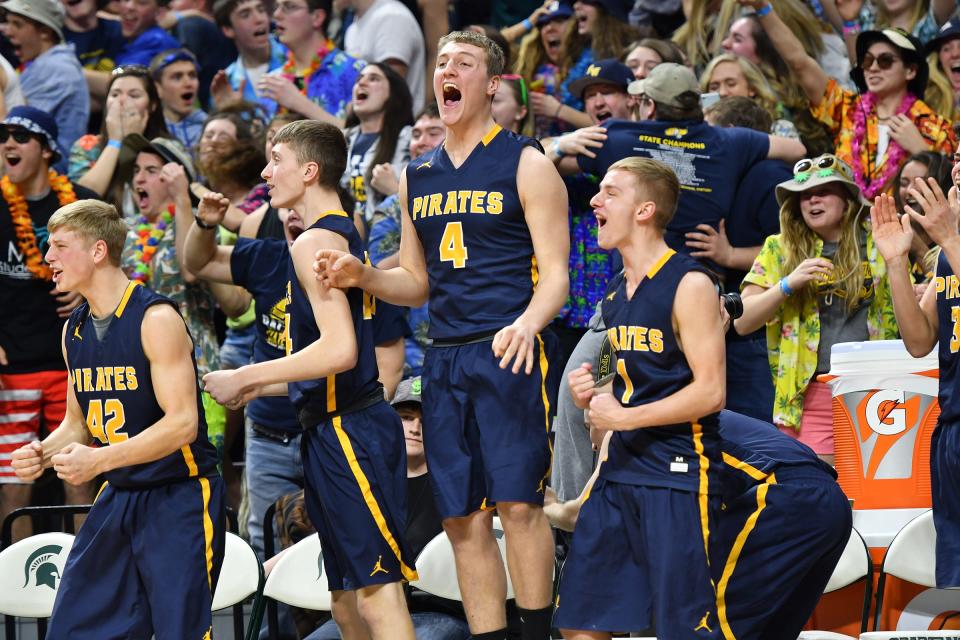 Pewamo-Westphalia players and fans are animated as the clock winds down and they hold on to a come from behind win against Iron Mountain 53-52 in the Boys Division 3 Basketball Championship Saturday, March 6, 2019.