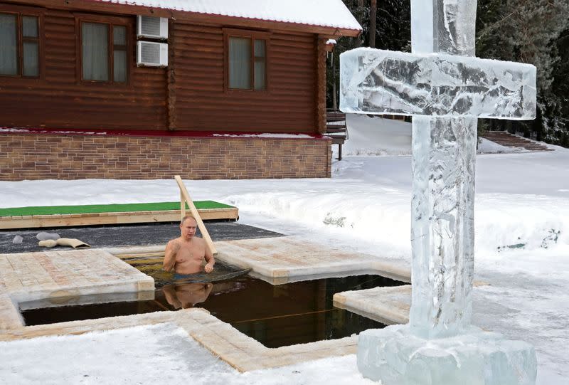 Russian President Putin takes a dip in icy waters during celebrations of the Orthodox Christian feast of Epiphany in Moscow Region