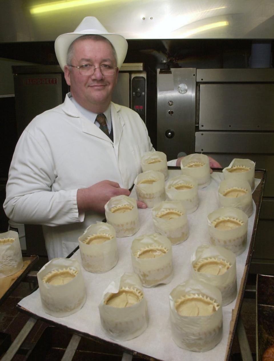Eastern Daily Press: David Williams pictured with a batch of GW Franks' legendary pork pies in 2003
