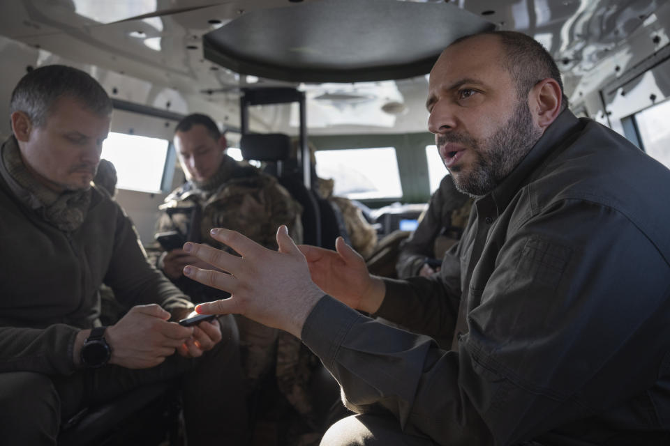 FILE - Ukrainian Defense Minister Rustem Umerov rides in an APC during a visit to the front-line city of Kupiansk, Kharkiv region, Ukraine, Thursday, Nov. 30, 2023. A gloomy mood hangs over Ukraine’s soldiers nearly two years after Russia invaded their country. Ukrainian soldiers remain fiercely determined to win, despite a disappointing counteroffensive this summer and signs of wavering financial support from allies. (AP Photo/Efrem Lukatsky, File)