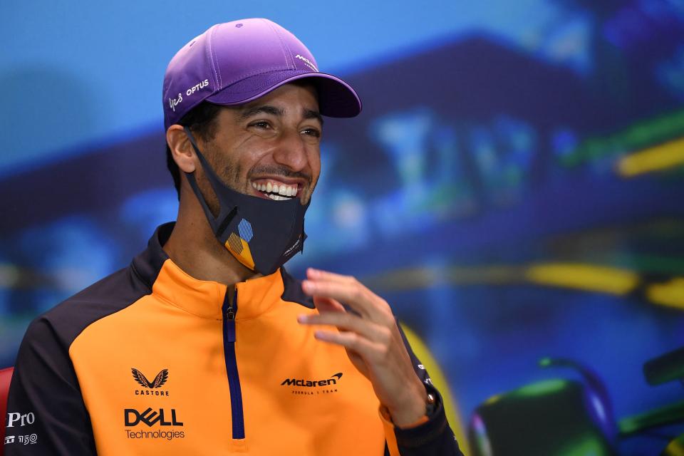 Seen here, McLaren's Daniel Ricciardo has a laugh with reporters ahead of the Australian Grand Prix. 