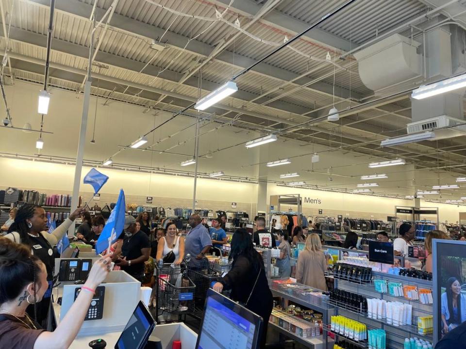 Shoppers line up Tuesday, May 28, 2024, during a VIP shopper sneak peek of the new Nordstrom Rack department store location at Elk Grove’s The Ridge shopping center.