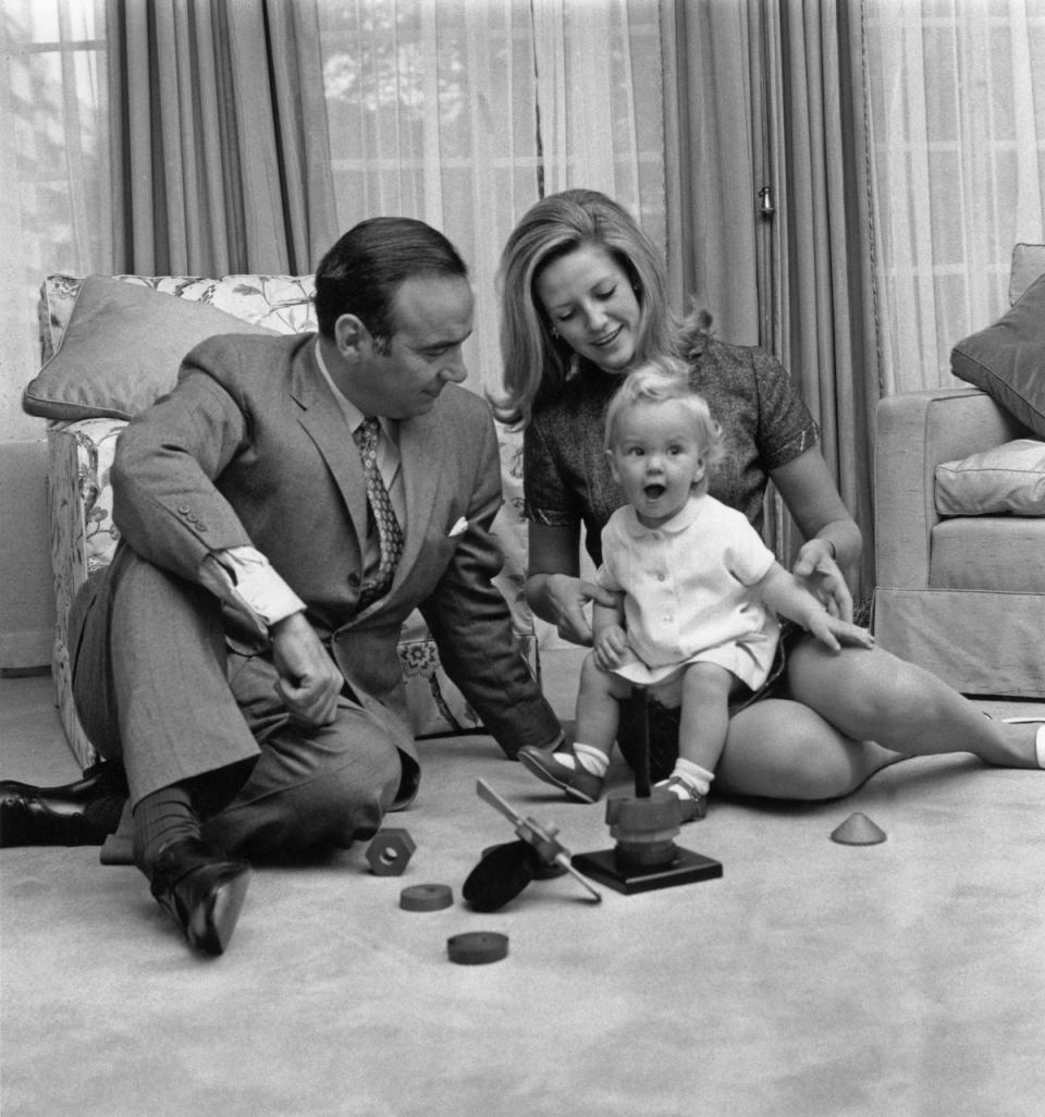 Rupert and Anna Murdoch with 14-month-old daughter Elisabeth in London, 1969 (Getty Images)