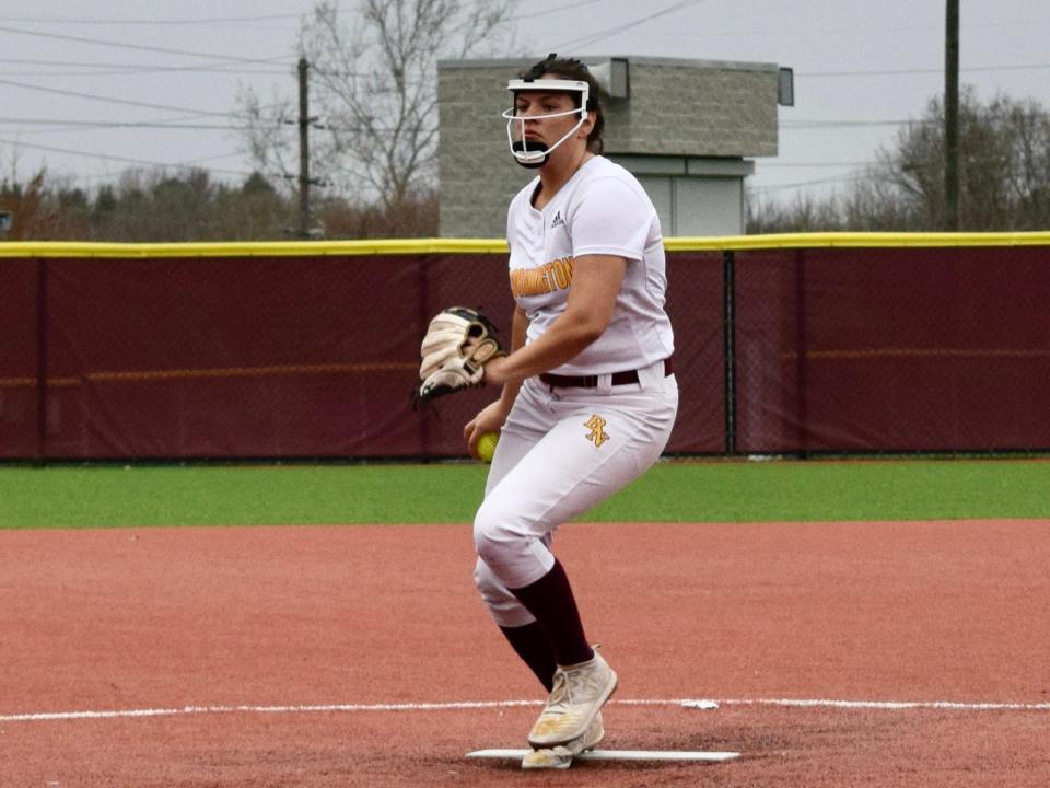 Bloomington North senior Caitlyn Boteler winds up to pitch during the Cougars' loss to Martinsville Friday. (Seth Tow/Herald-Times)