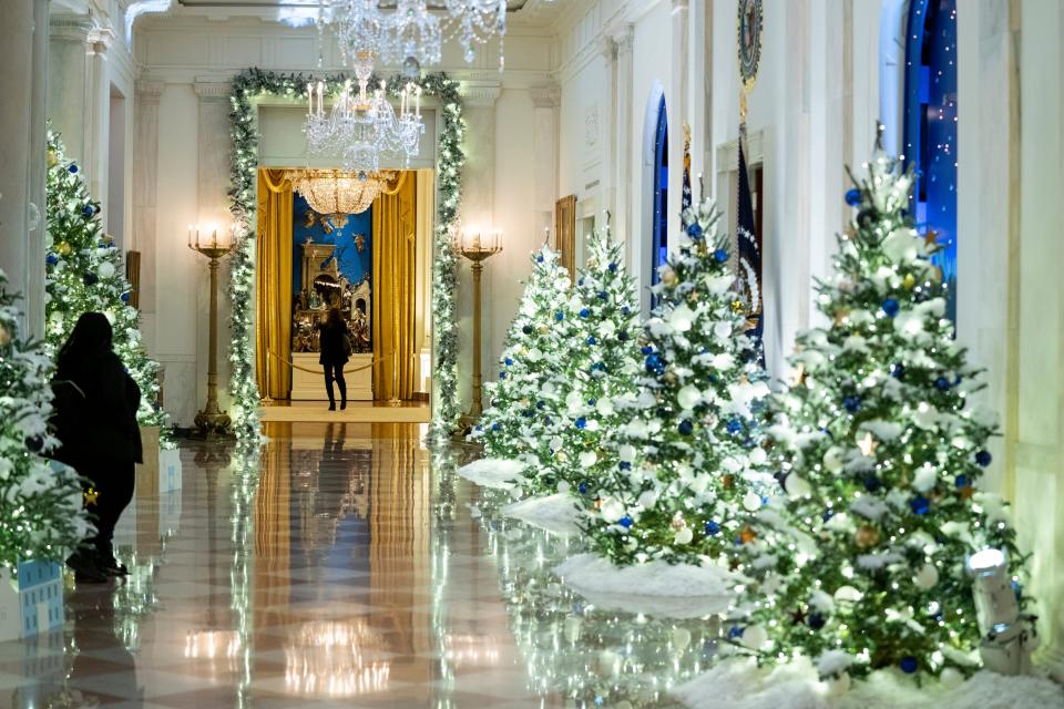 The Cross Hall of the White House decorated for Christmas.