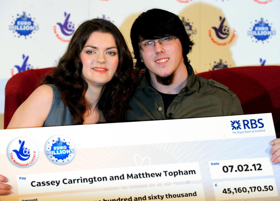 Matt Topham with Cassey Carrington after winning £45 million in 2012. (PA)