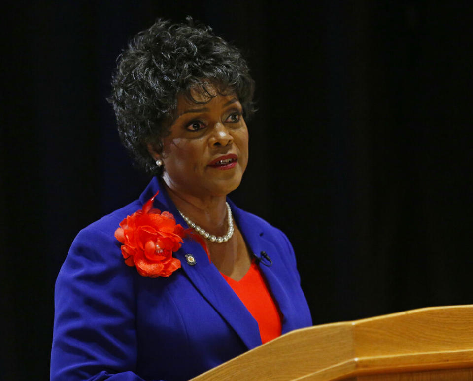 Then-Oklahoma state Sen. Connie Johnson stands at a podium during a debate at Oklahoma State University in Stillwater in 2014.