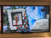 A picture of S R Nathan seen next to his casket at the UCC. (Photo: TV screenshot)