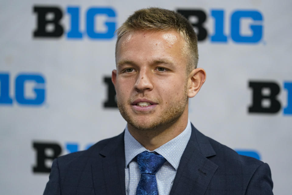 Wisconsin's Brad Davison speaks during the Big Ten NCAA college basketball media days in Indianapolis, Friday, Oct. 8, 2021. (AP Photo/Michael Conroy)