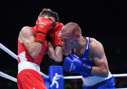 Michael Conlan, in red, and Vladimir Nitinkin (Getty Images)