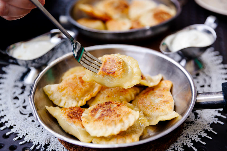 <div><p>"I hand-make pierogi for my food truck. ... Making one or two batches is annoying, but making enough for a commercial operation completely sucks. The dough I use doesn’t have water in it, just egg and sour cream, so the gluten doesn’t form into very strong bonds. That means that I can’t use a pasta roller to make sheets of dough to cut into dumpling skins. I have to hand-roll everything with a rolling pin, and my work surface isn’t big enough to roll out an entire batch."</p><p>—<a href="https://www.reddit.com/user/wzl46/" rel="nofollow noopener" target="_blank" data-ylk="slk:u/wzl46;elm:context_link;itc:0;sec:content-canvas" class="link ">u/wzl46</a></p></div><span> Alexander Spatari / Getty Images</span>