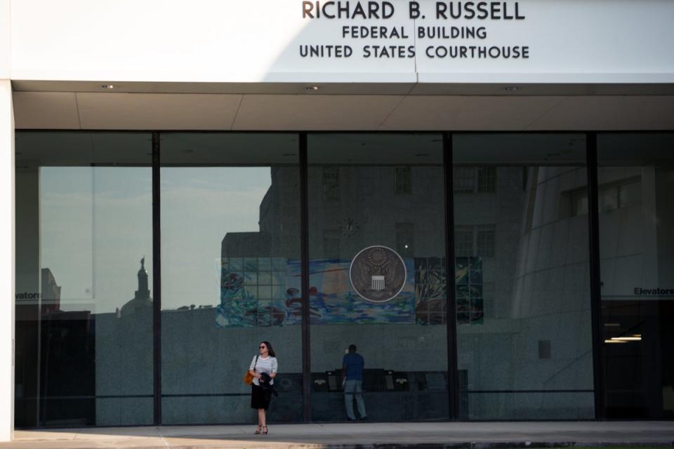 Mark Meadows, Brad Raffensperger and others testified in Atlanta on 28 August following the former White House chief of staff’s attempt to remove the Georgia racketeering case from Fulton County to federal court. (Getty Images)