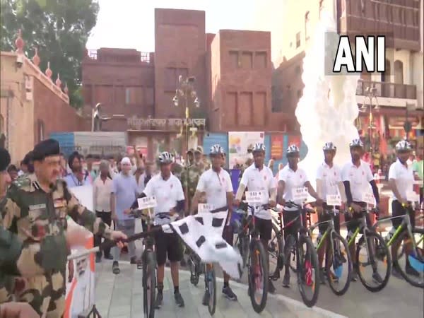 BSF DIG Bhupendra Singh flagging off BSF's cycle rally from Jallianwala Bagh, Amritsar (Photo/ANI)