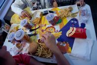<p>McDonald's advertisements have featured a crew of cartoons since the '80s, including Birdie, Hamburglar, Grimace, and the Professor. They even appear around the restaurants, as seen on a table here.</p>