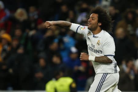 Football Soccer - Real Madrid v Celta Vigo - Spanish King's Cup - Santiago Bernabeu stadium, Madrid, Spain - 18/01/17 Real Madrid's Marcelo celebrates his first goal. REUTERS/Juan Medina