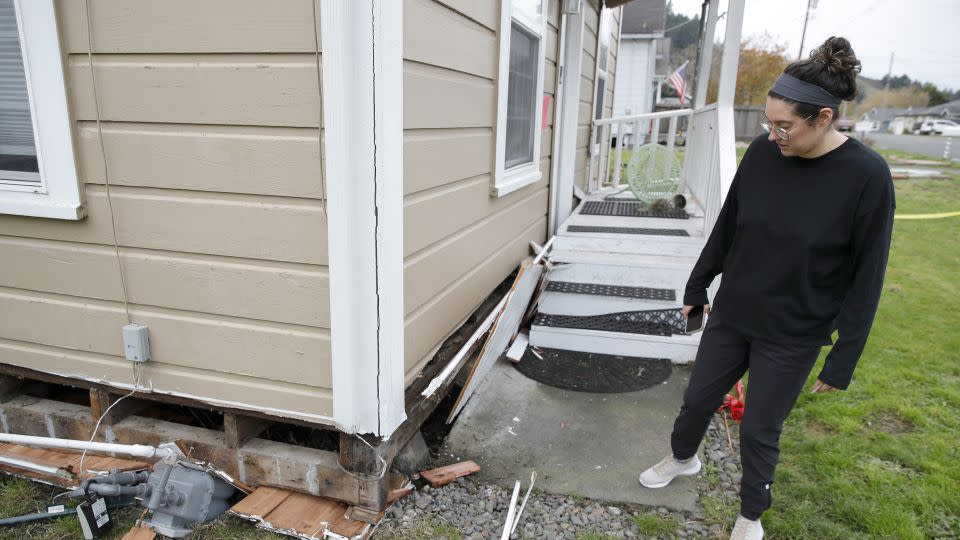 Jacqui McIntosh inspects damage at her red-tagged home in Rio Dell on December 21, 2022. - Jane Tyska/Digital First Media/East Bay Times/Getty Images