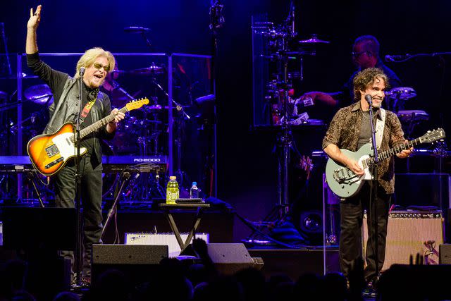 <p>Anthony Pidgeon/Redferns/Getty Images</p> Daryl Hall and John Oates performing in 2018
