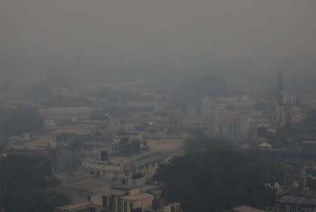 Buildings are seen shrouded in smog in New Delhi, India, November 8, 2018. REUTERS/Anushree Fadnavis